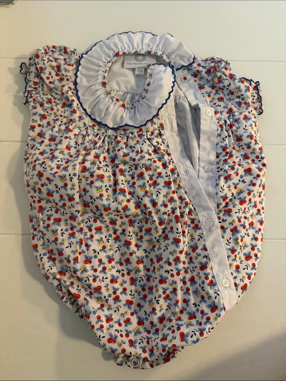 The Proper Peony White Cherry Print Baby One-Piece